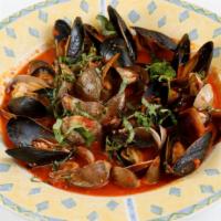Cozze e Vongole · Prince Edward Island mussels, Manila clams, olive oil, white wine, Roma tomato and crostini.