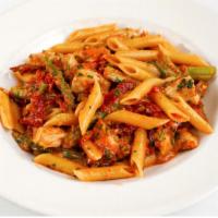 Penne Fantasia · Tender chicken breast, sun-dried tomato, asparagus and a touch of cream.