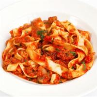 Pappardelle alla Bolognese · Ribbon pasta, mushrooms, tomato, ground pork, veal and beef sauce.
