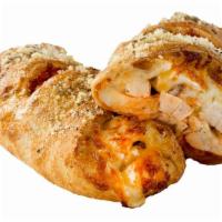 Buffalo Chicken Calzone · Ranch, grilled chicken strips, hot Buffalo sauce, Parmesan cheese and gourmet cheese blend. 