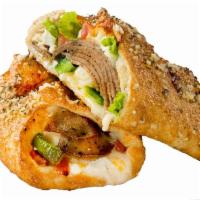 Gyro Calzone · Slow roasted gyro meat, diced tomatoes, fresh onions, green peppers, feta cheese, crispy let...