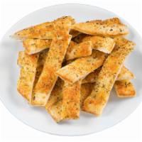 Garlic Breadsticks · Freshly baked bread buttered with our rich garlic spread, sprinkled with oregano and toasted...