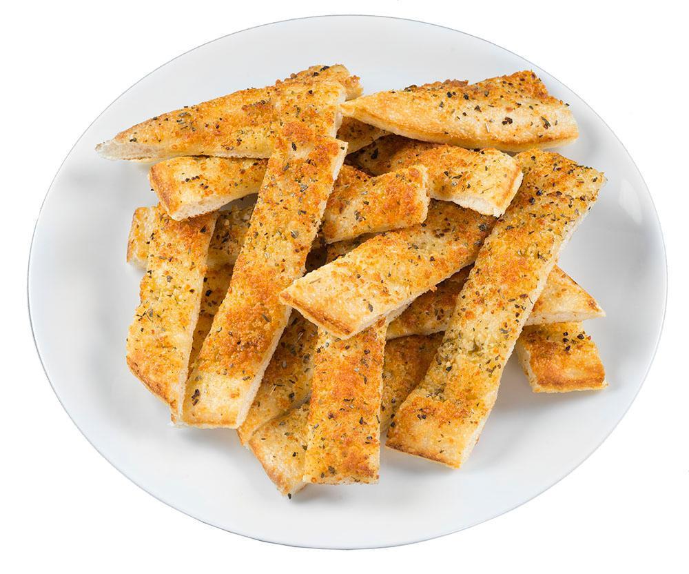 Garlic Breadsticks · Freshly baked bread buttered with our rich garlic spread, sprinkled with oregano and toasted to perfection. Served with a side of homemade marinara.