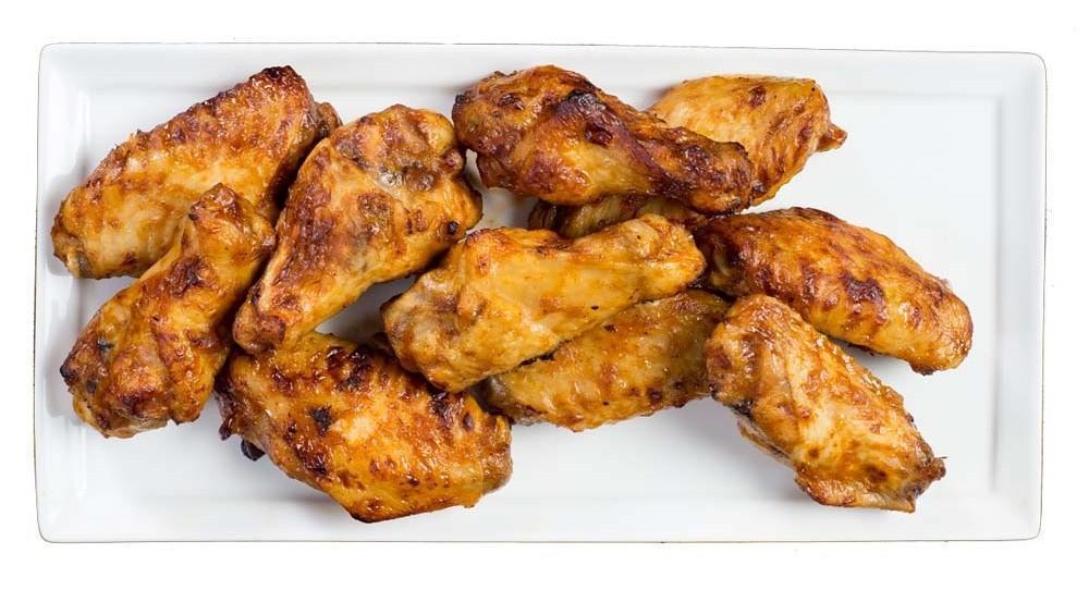 BBQ Chicken Wings · 1lb. oven-roasted chicken wings tossed in our tangy BBQ sauce