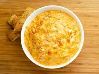 Buffalo Chicken Dip · Spice up your night! Try our signature Buffalo Chicken Dip made with tender chicken, buffalo sauce, sour cream, and a variety of cheeses. Served with an 8