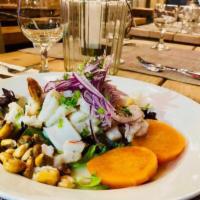 Mixto Ceviche · Today's fish with shrimp, octopus and calamari ceviche. Served with sweet potato and white c...