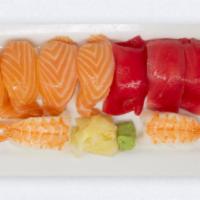 10 Piece Sushi Special Box · Assorted fish with tuna, salmon, red snapper, & shrimp. Add $1 for eel. 1 side salad. 1 miso...