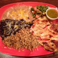 Pollo Asado Platter · Charcoal grilled chicken served with salsa, tortillas, rice, beans and nopales salad.