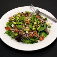 Gigi's Salad · Spring mix, avocado, feta, tomato, cucumber, in a balsamic demi-glaze.