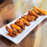 BBQ Chicken Wings · Served with blue cheese dressing. 