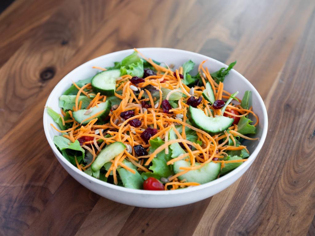 House Salad · Organic fresh mixed greens, cherry tomatoes, cucumbers, carrots and croutons with champagne vinaigrette. 