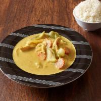 18. Yellow Curry · Choice of meat simmered in coconut milk with homemade yellow curry paste, tomatoes, potatoes...