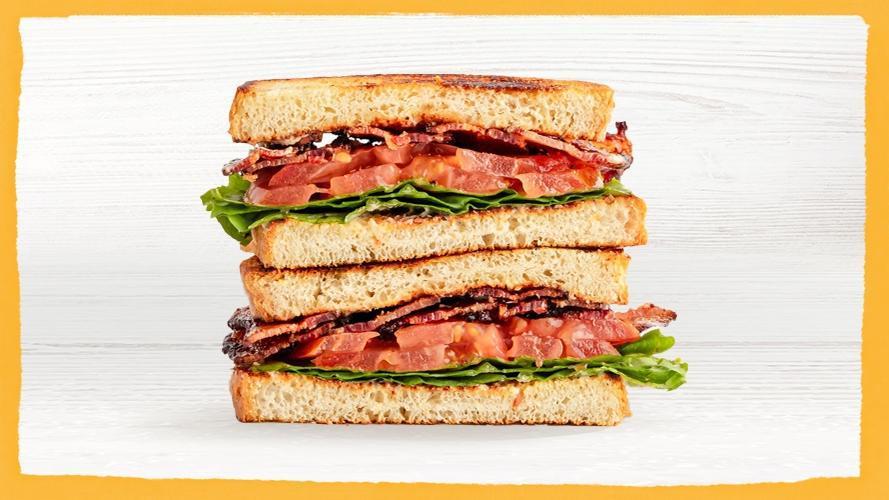 Loaded BLT · six slices of smoked bacon, organic green leaf, organic tomatoes, mustard aioli, sourdough (610 cal)