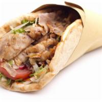 Chicken Shawarma Sandwich (A la carte) · Served with tomato, cucumber and garlic sauce. Tzatziki on the side.