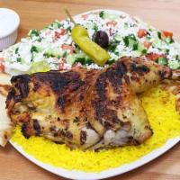 Greek Chicken Plate · Served with yellow rice, greek salad, hot pita, and a 1/2 grilled marinated chicken. Tzatzik...