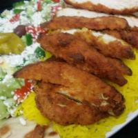 Chicken Cream Chop Plate · Served with yellow rice Greek salad, hot pita, and seasoned breaded chicken breast. Tzatziki...