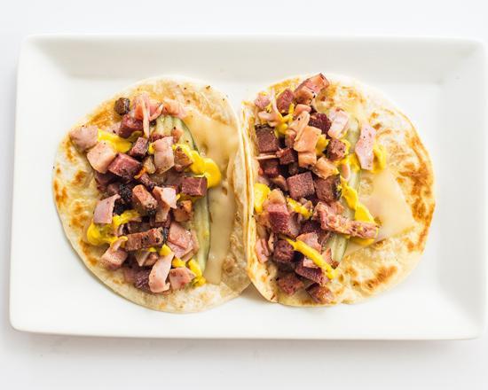 Cuban Tacos · 2 Cuban Tacos - Montreal Style Prime Smoked Brisket, Sliced Ham, Pickle, Mustard & Swiss