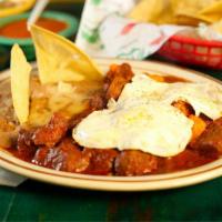 Chile Colorado · Served with two eggs (any style) and refried beans. Choice of corn or flour tortillas