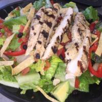 Baja BBQ Chicken Salad · Fresh salad greens, kale, onion, bell pepper, jicama, tortilla strips, roasted corn, black b...