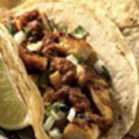 Baja Style Taco · Your choice protein on corn tortillas with salsa, onions, and cilantro.