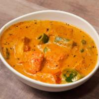 Chicken Tikka Masala · Boneless grilled chicken cooked with tomato, cream and special spices. A divine buttery taste.