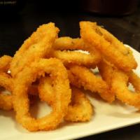 Fried Calamari · Calamari lightly breaded and fried to perfection. Served with spicy mayo sauce.