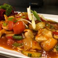 Sweet and Sour Entree · Choice of protein sauteed in Thai sweet and sour sauce with tomatoes, onions, cucumber, pine...