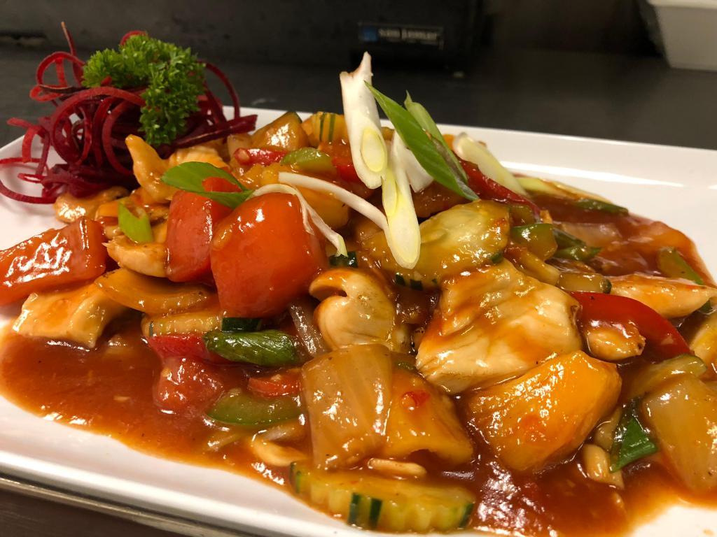 Sweet and Sour Entree · Choice of protein sauteed in Thai sweet and sour sauce with tomatoes, onions, cucumber, pineapple, bell pepper, and scallions.