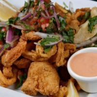 Varadero Seafood Platter · Combination of fried fish, calamari, shrimp and fried yucca served with chipotle sauce.
