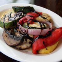 Veggie Wrap · Grilled mushrooms, grilled zucchini and roasted red peppers in balsamic glaze. 