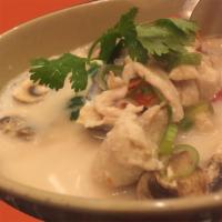 Tom Kha Kai Soup · Chicken in coconut milk soup seasoned with galangal, lemongrass, mushroom and lime juice. 