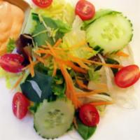 House Green Salad · Lettuce, carrot, cucumber, tomatoes, and house salad dressing.