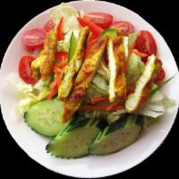 Grilled Chicken Salad · Grilled chicken, lettuce, carrot, cucumber, tomatoes, and house salad dressing.