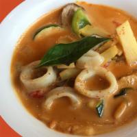 Red Curry · Spicy. Red curry, coconut milk, peppers, basil, peas, eggplant, bamboo shoot, zucchini and m...