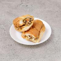 Philly Cheesesteak Grinder · Sauteed mushrooms, onions, peppers, mayo and American cheese.