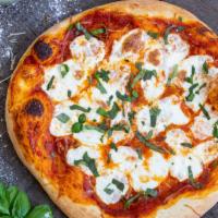 Margherita Pizza · Mozzarella cheese, fresh basil, tomato sauce and olive oil.