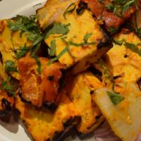 Paneer Tikka · Fresh tender cubes of Paneer marinated in aromatic Indian herbs and cooked in the clay oven