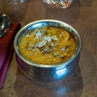 Vegetable Korma · Fresh garden vegetables delicately flavored with coconut and gently simmered in yogurt with ...