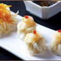 A4. Shrimp Shumai · 3 pieces. Steamed dumplings.