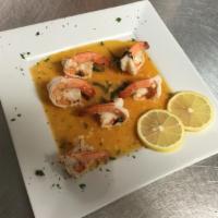 Shrimp Scampi · Over linguine pasta.