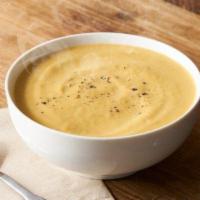 Butternut Squash Soup · Roasted squash and herbs pureed into creamy richness. Gluten-free.