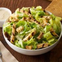 Caesar Salad · Fresh romaine lettuce tossed with Asiago cheese, croutons, and Erik's famous Caesar dressing.