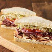 Pot Belly Sandwich · Slices of turkey breast topped with pastrami, Monterey Jack cheese, onions, tomato, clover s...