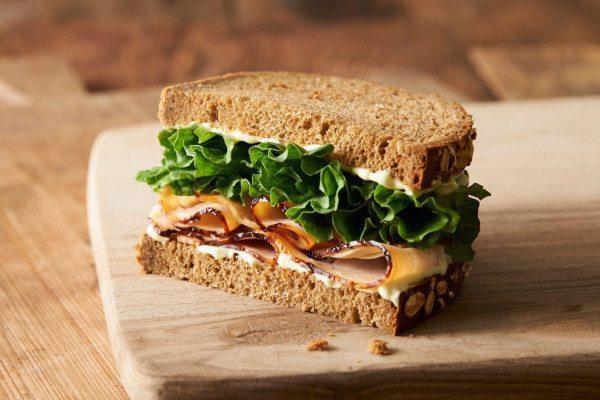 Kid's Tommy Turkey Meal · Comes with bottled water. 1/2 of a turkey breast sandwich with lettuce and Erik's Secret Goo on hearty 9-grain bread.