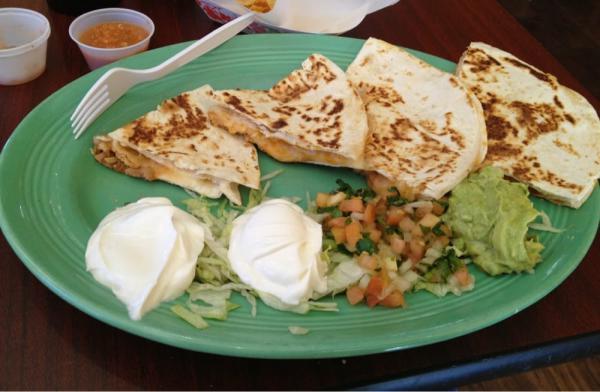Super Quesadilla · Your choice of meat, sour cream and guacamole.