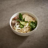 77 Deluxe Pho · Chicken breast, brisket and sliced steak, onions and cilantro in beef broth. Served with a s...