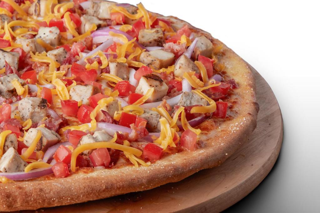 Gluten Free Bacon Chicken Supreme Pizza · Signature Garlic White Sauce on our Gluten Free Crust, topped with Mozzarella and Cheddar Cheeses, All-Natural Grilled Chicken, Smoked Bacon, Fresh Roma Tomatoes, and Red Onions.
