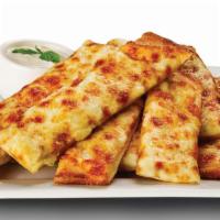 Cheezee Garlic Bread · A classic favorite! Signature Creamy Garlic Sauce topped with Mozzarella Cheese and served w...