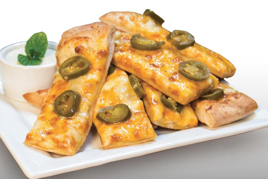 Cheeze Jalapeno Bread · Signature Creamy Garlic Sauce, topped with Mozzarella Cheese, Cheddar Cheese, and Jalapeños. Served with a side of Ranch Sauce.