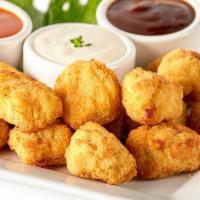 8 Boneless Wings · Served with your choice a dipping sauce.